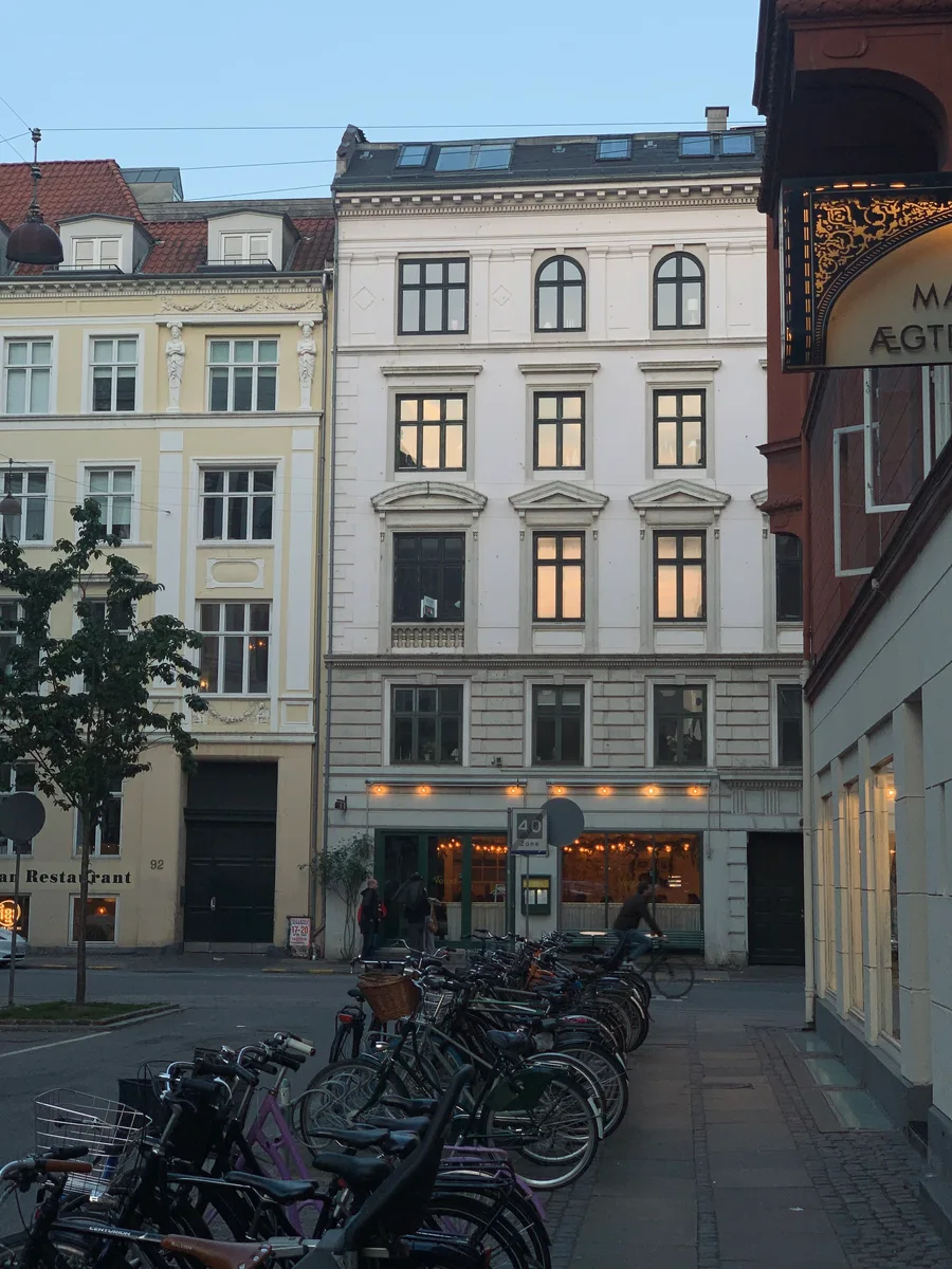 Bicycles parked outside a Copenhagen courtyard